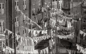 cropped_clothes_hanging_out_of_tenement_building_windows